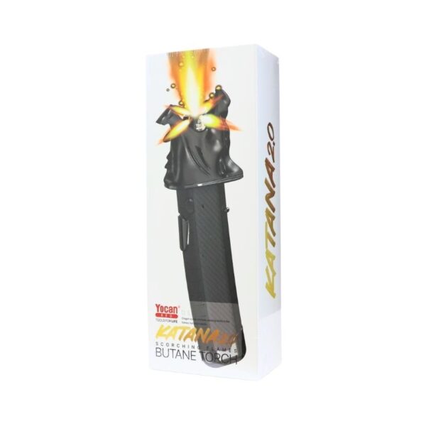 White product packaging box for a Katana 20 butane torch lighter, featuring a graphic of the black lighter with orange flame on the front and vertical 'KATANAA 20' text on the side.
