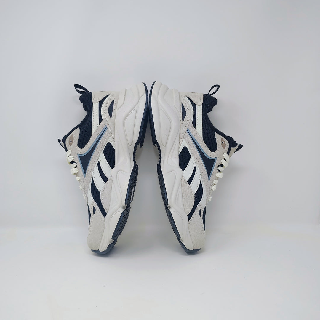 Reebok royle charge shoes (in a cream and black colorway size 9